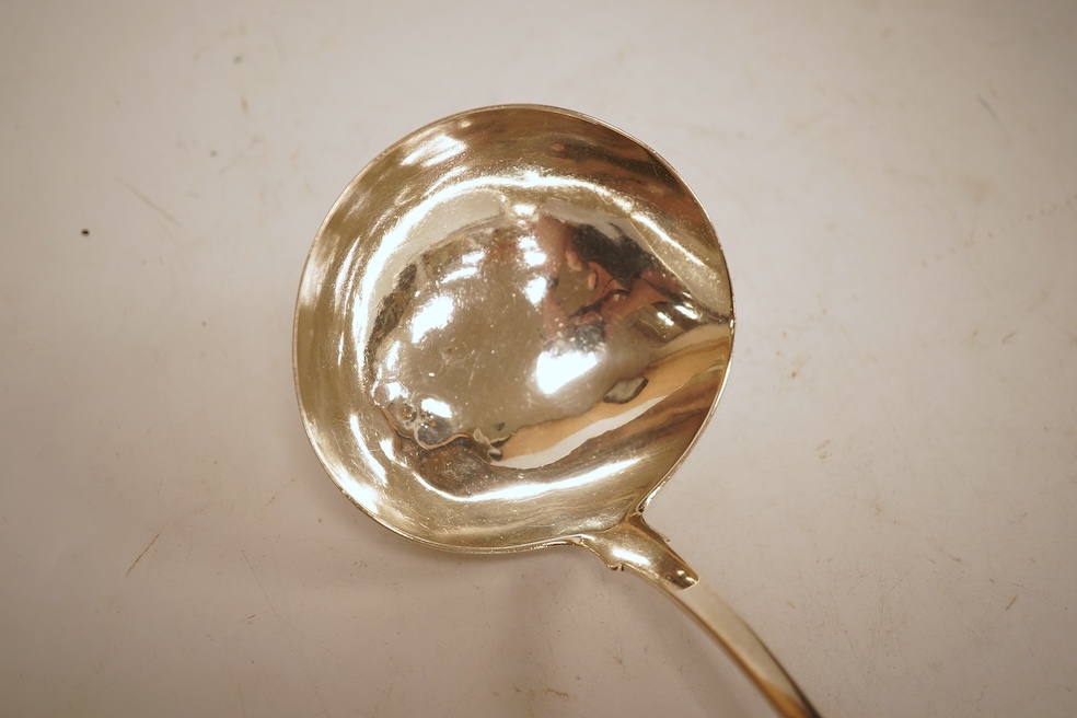 An early George III silver Old English pattern soup ladle, John Lampfert, London, 1768, 32.3cm, 4.3oz.